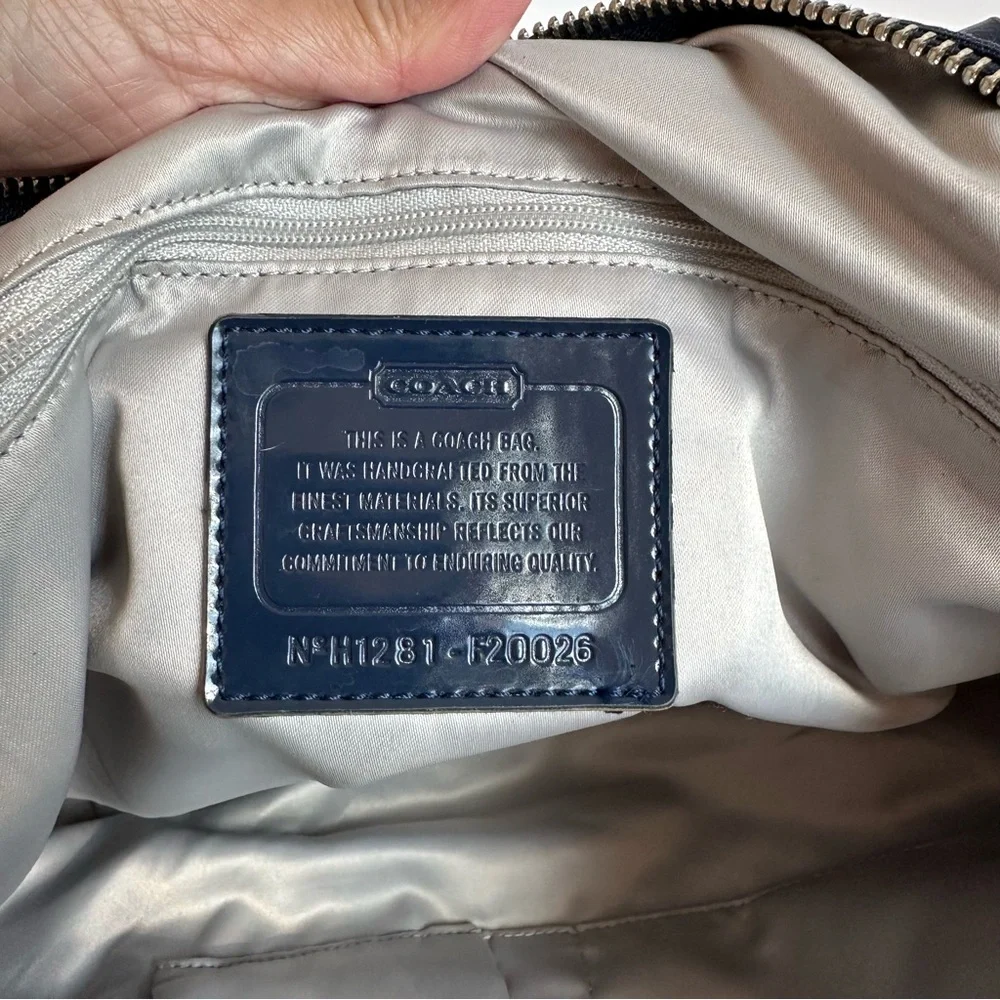 Coach “daisy signature